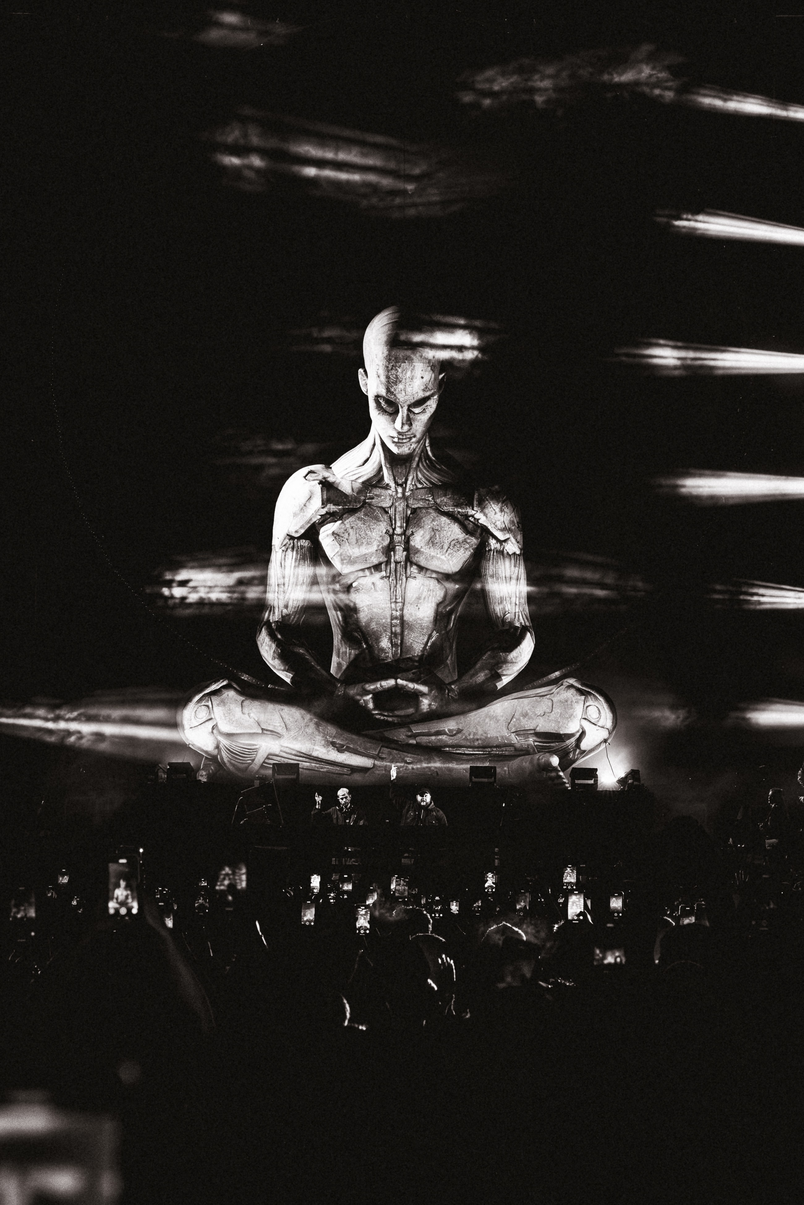 Black and white portrait of a dance instructor against a light background.