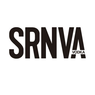 Black and white portrait of a dance instructor against a light background.