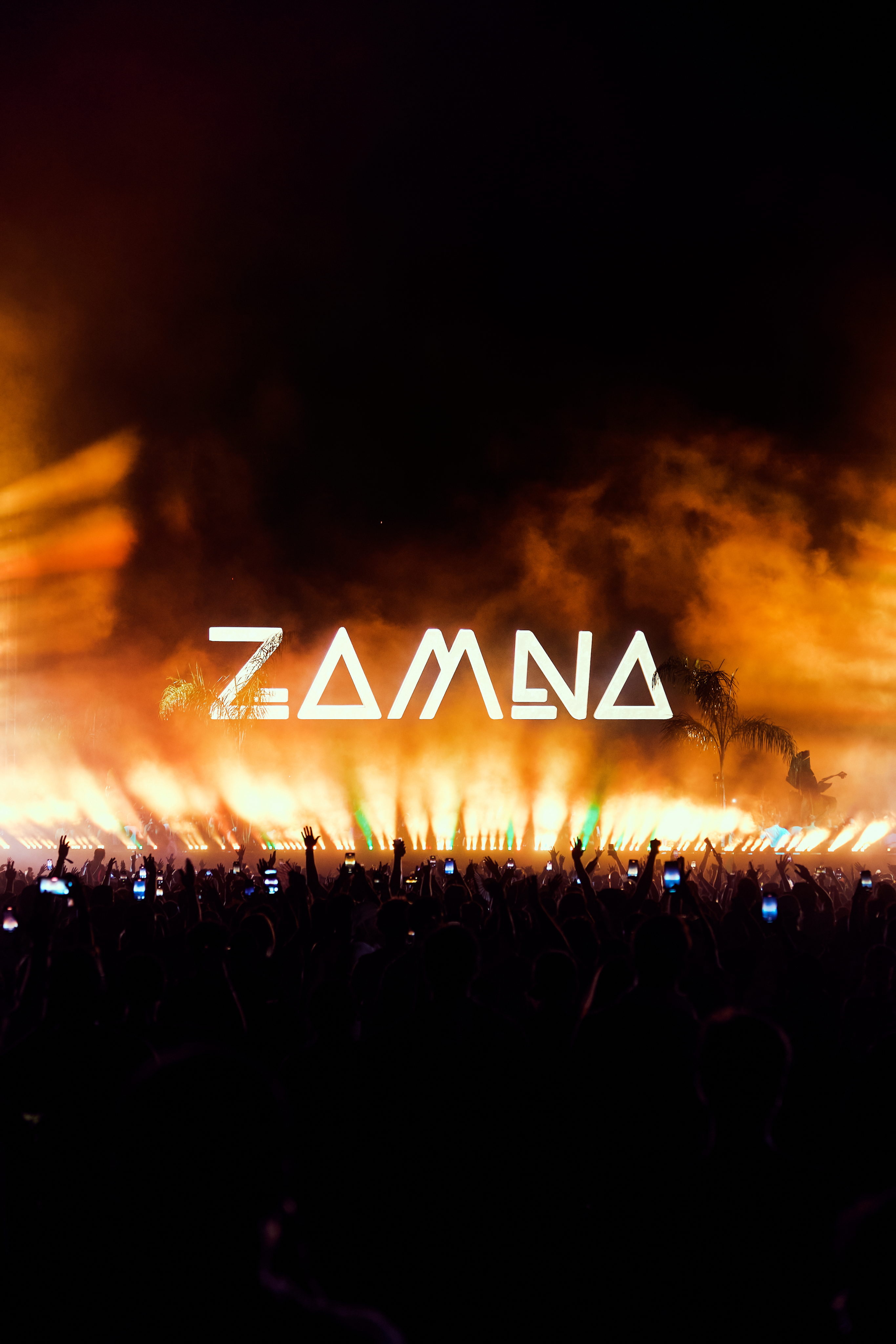 Black and white portrait of a dance instructor against a light background.